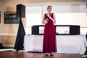 The beautiful maid of honor, Melissa, making her speech.